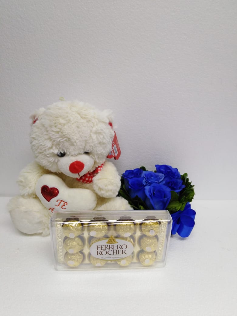 6 Rosas Azules en Caja Corazón, Bombones Ferrero Rocher 150Grs y Peluche con corazón de 30cm